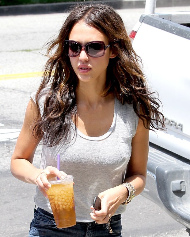 Jessica Alba drinks an iced beverage as she goes shopping at Bel Bambini baby boutique on Robertson Boulevard on June 18, 2010