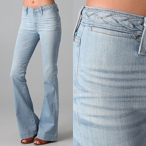 These flare jeans feature welt front pockets and patch back pockets