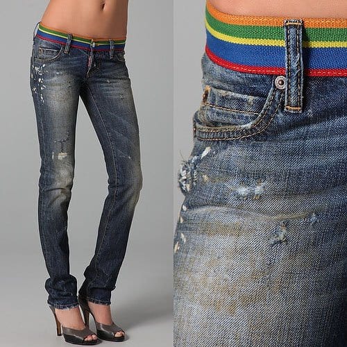 These straight-leg jeans feature a colorful striped waistband. 5-pocket styling and 2-button fly