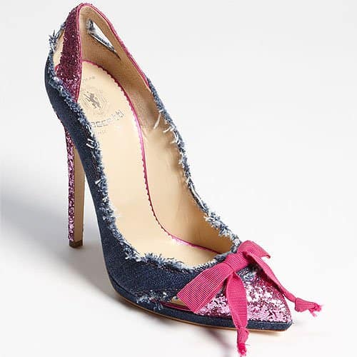 Chunky glitter perfects a precocious, pointy-toe pump set atop a towering heel