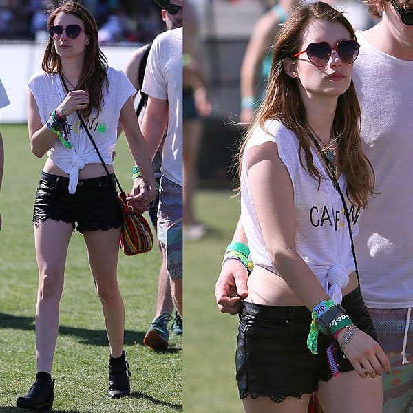 Emma Roberts' bland knotted t-shirt + short shorts combo at Coachella