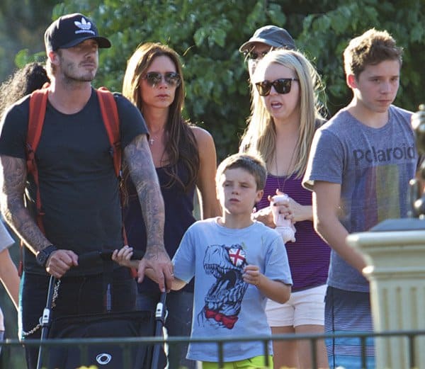 Victoria Beckham spending a day with her husband, David, and kids at Disneyland in Anaheim