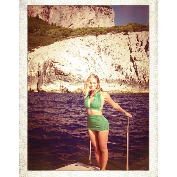 Beyonce paired a green halterneck top with matching high-waisted ruched bottoms
