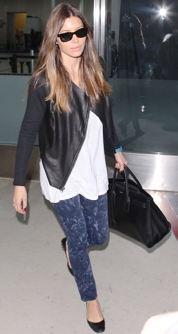 Jessica Claire Timberlake wears spotted print pants at LAX