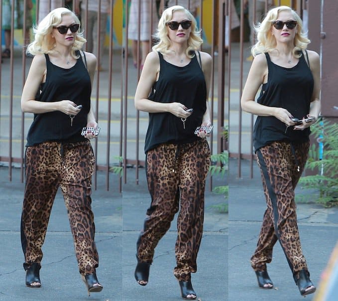 Gwen's outfit consisted of a loose black tank and a pair of leopard-print lounge pants that concealed her rumored baby bump