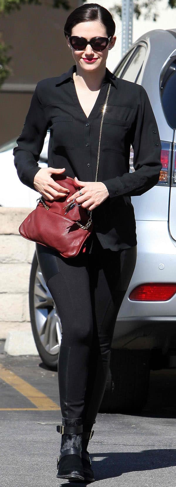 Emmy Rossum styled her leggings with Rachel Zoe Collection boots and a Zadig & Voltaire bag
