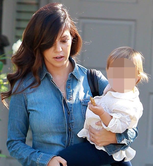 Kourtney Kardashian taking her baby daughter, Penelope Disick, to First Class in Beverly Hills on October 23, 2013