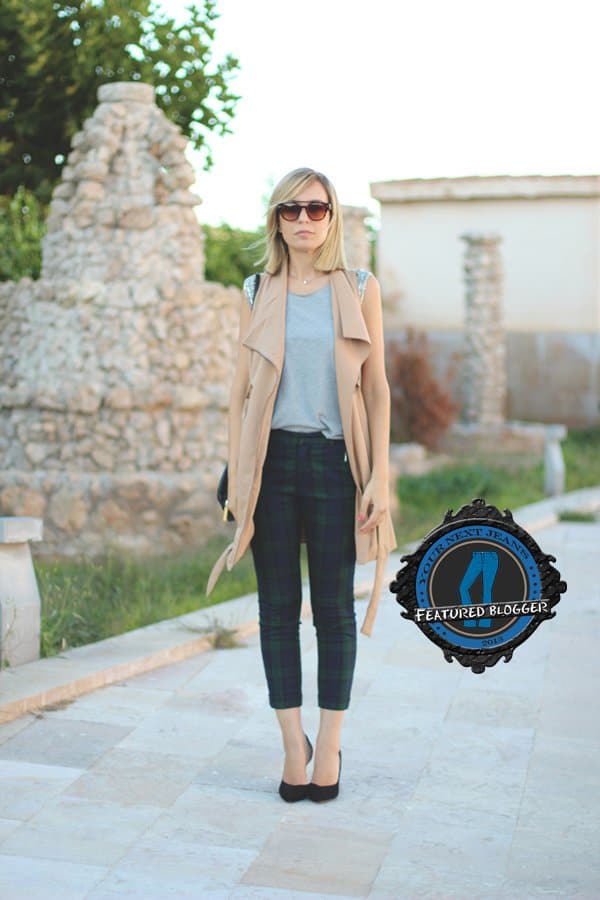 Priscila put together an effortless outfit with cropped tartan pants and sunnies