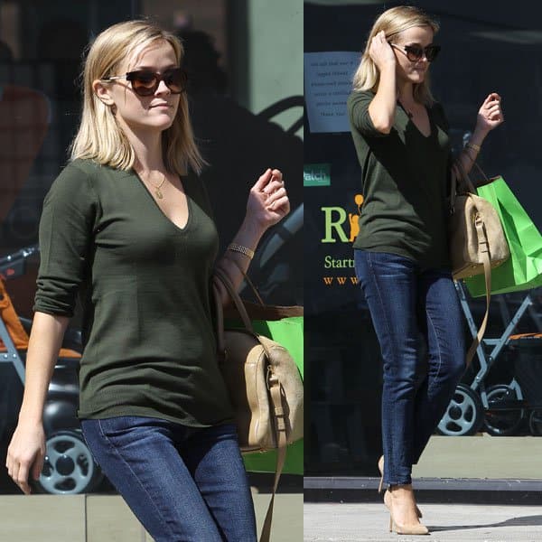 Reese Witherspoon wore her denims with a green scoop-neck top, a pair of nude heels, and a structured bag in the same nude hue