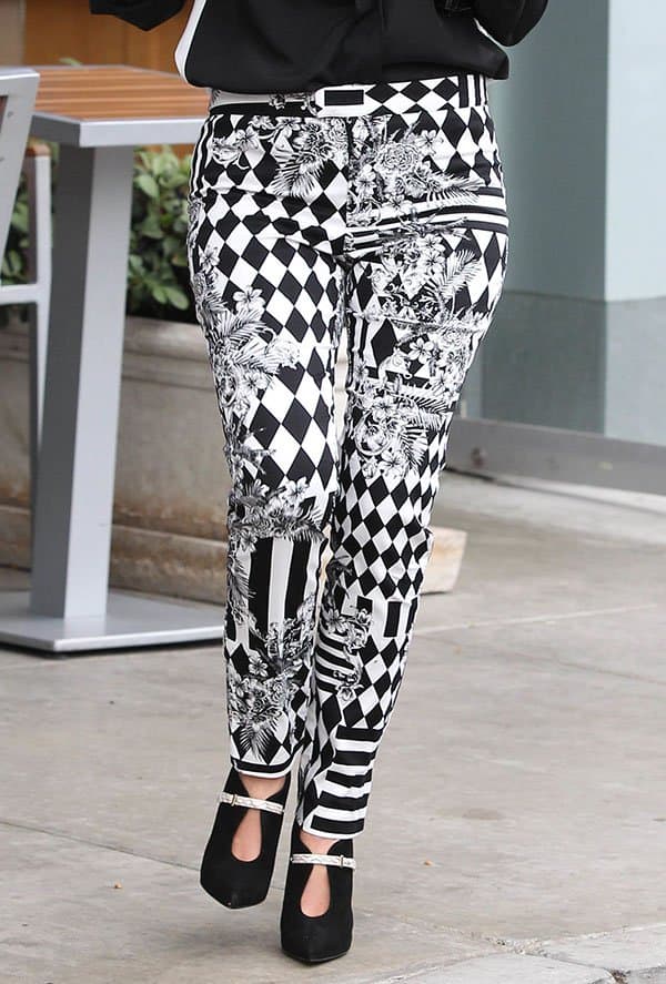 Kourtney Kardashian's Balmain black and white printed stretch cotton denim biker jeans