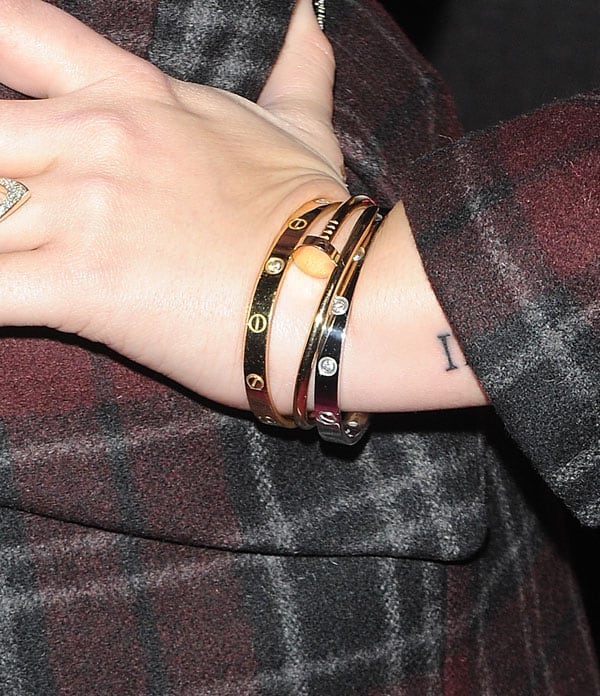 Demi Lovato showing off her bracelets
