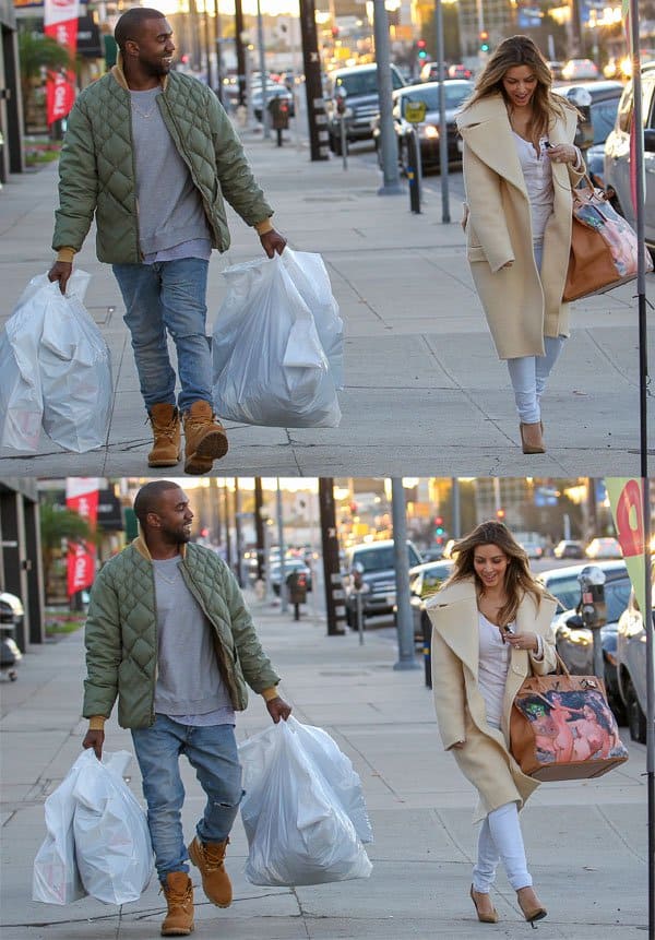 Kim Kardashian spotted with fiancé Kanye West shopping at a sports good store in Los Angeles on December 26, 2013
