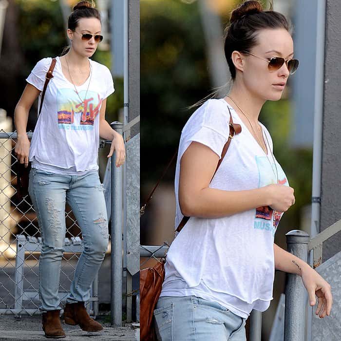 Pregnant Olivia Wilde rocks grunge maternity clothes while leaving an office building