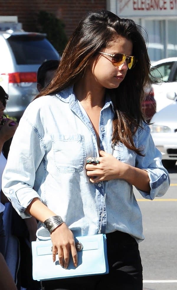 Selena Gomez wearing a menswear-inspired chambray shirt from AG Adriano Goldschmied