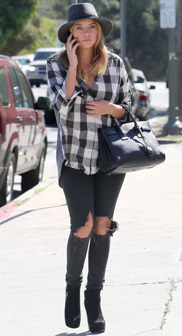 Ashley Benson wears ripped knee jeans and ankle boots in Santa Monica