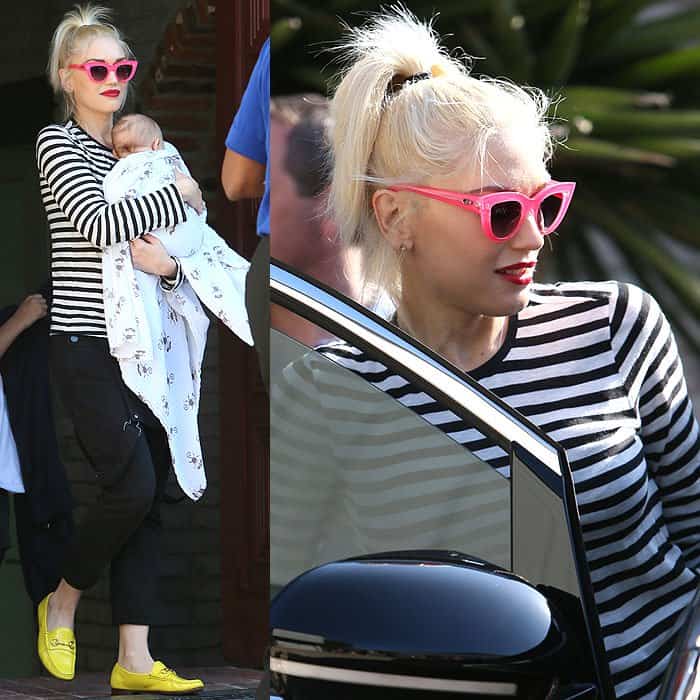 Gwen Stefani carrying baby Apollo at Joel Silver's Memorial Day party in Malibu, California, on May 26, 2014