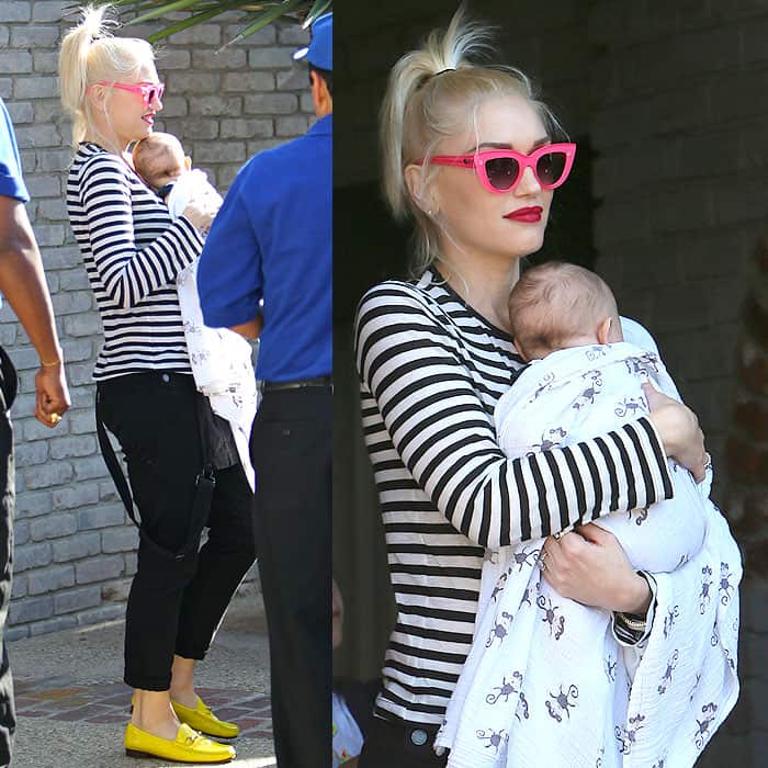 Gwen Stefani holding baby Apollo close while leaving Joel Silver's annual Memorial Day party