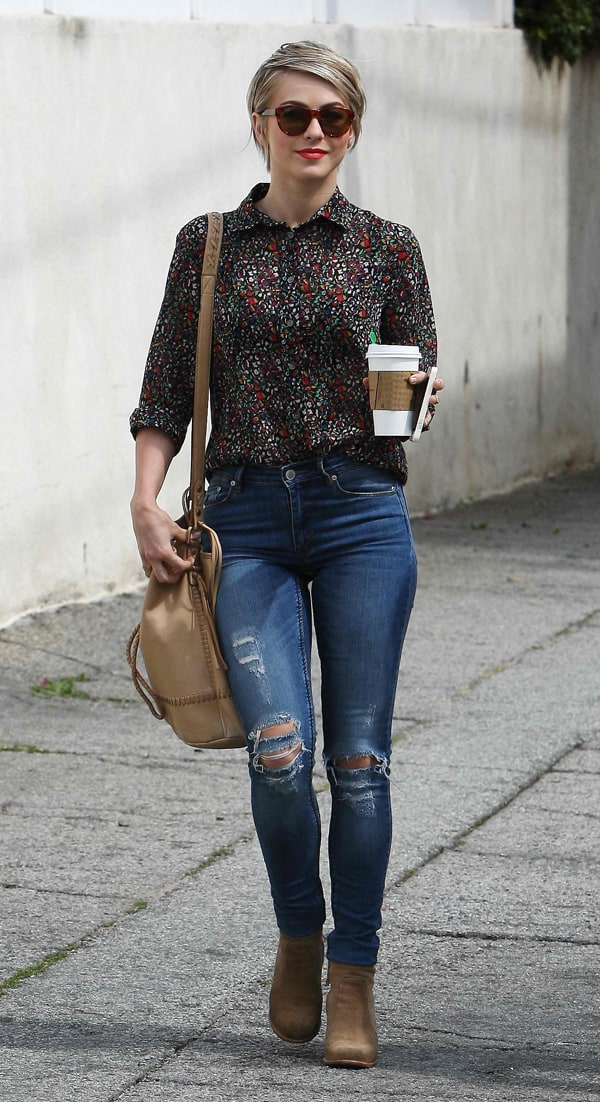Julianne Hough wears a printed button-down shirt with ripped jeans