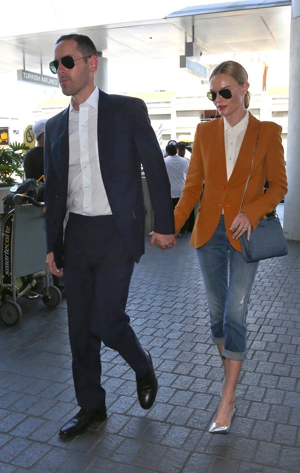 Kate Bosworth leaves Los Angeles International Airport (LAX) holding hands with husband Michael Polish