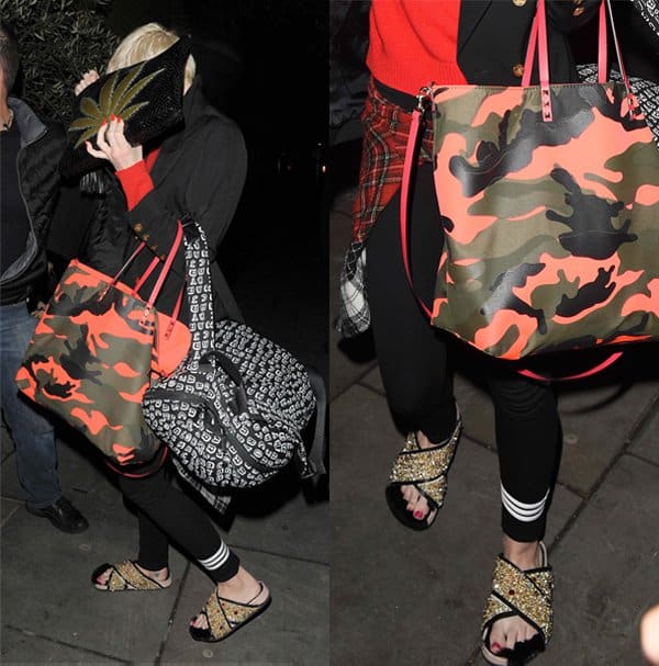 Miley Cyrus arriving at Claridge's hotel holding a cannabis leaf logo drugs bag over her face