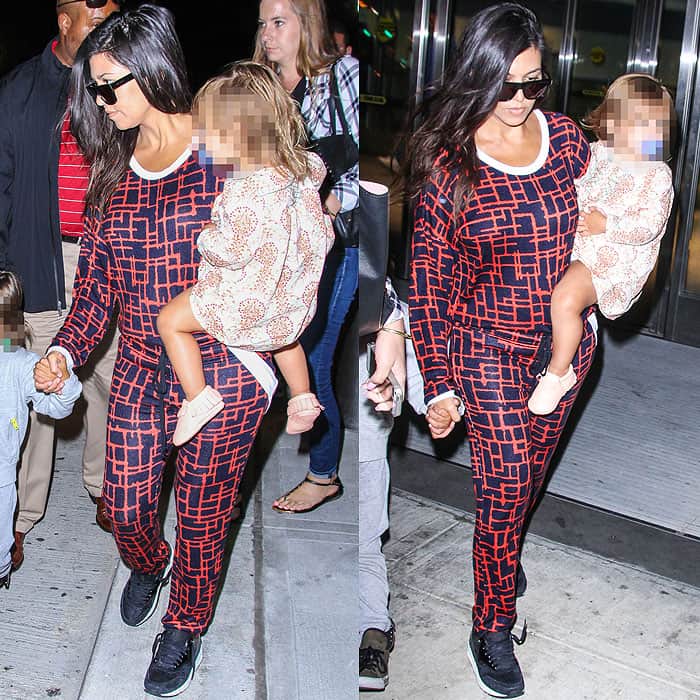 Kourtney Kardashian arriving in luxurious loungewear at John F. Kennedy International Airport