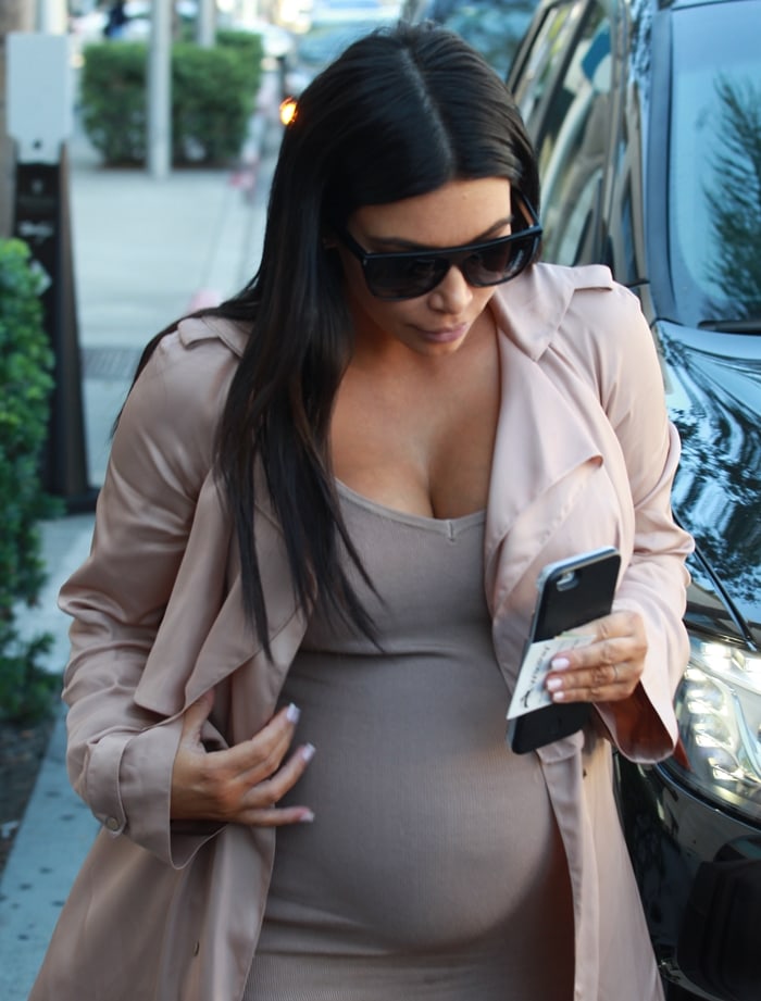 Kim Kardashian was pregnant with Saint West and gave birth on December 5, 2015