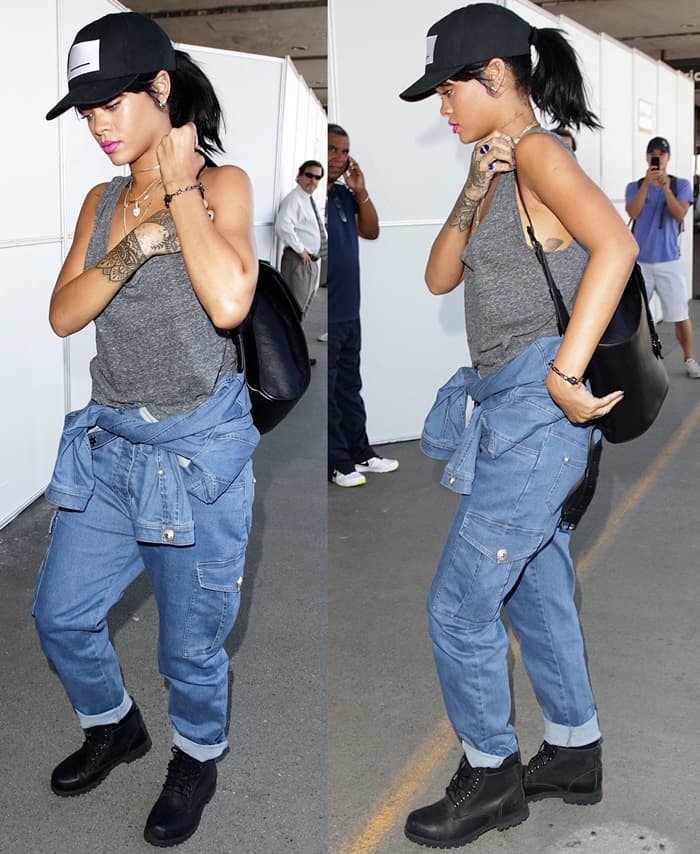 Rihanna wearing a denim jumpsuit by Balmain at Los Angeles International Airport (LAX)