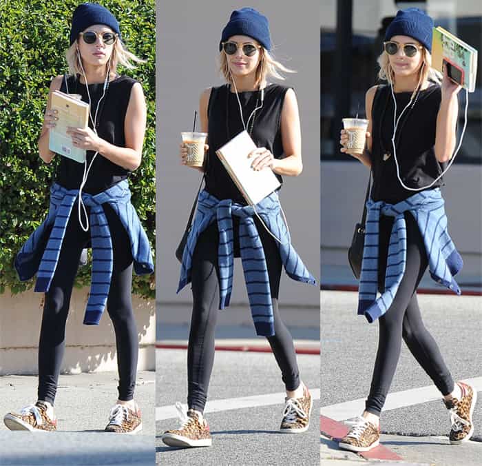 Emma Roberts is seen leaving Urth Café in Los Angeles wearing a beanie hat, sunglasses and carrying a drink
