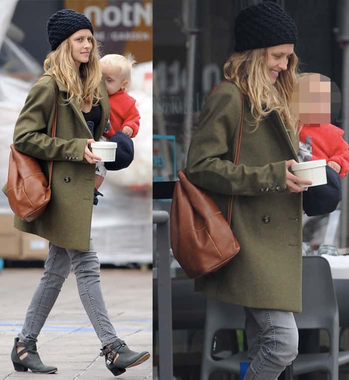 Actress Teresa Palmer carrying her son Bodhi after having breakfast at Café Gratitude in Los Angeles