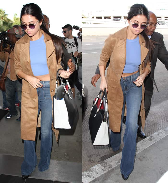 Selena Gomez wears J Brand high-rise flare jeans with a Truly Madly Deeply fitted cropped tank top