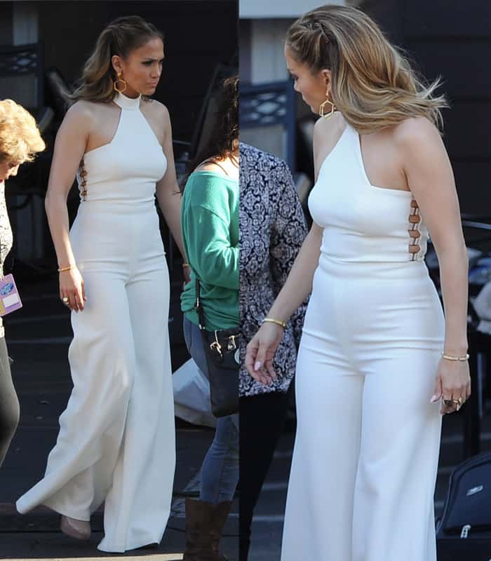 This white halter jumpsuit that flares out at the leg gave off the ‘70s feel to Jennifer’s look