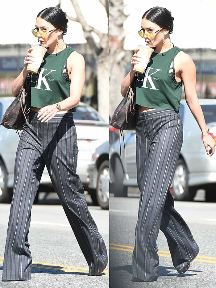 A casual looking Vanessa Hudgens enjoys an iced coffee in Los Angeles