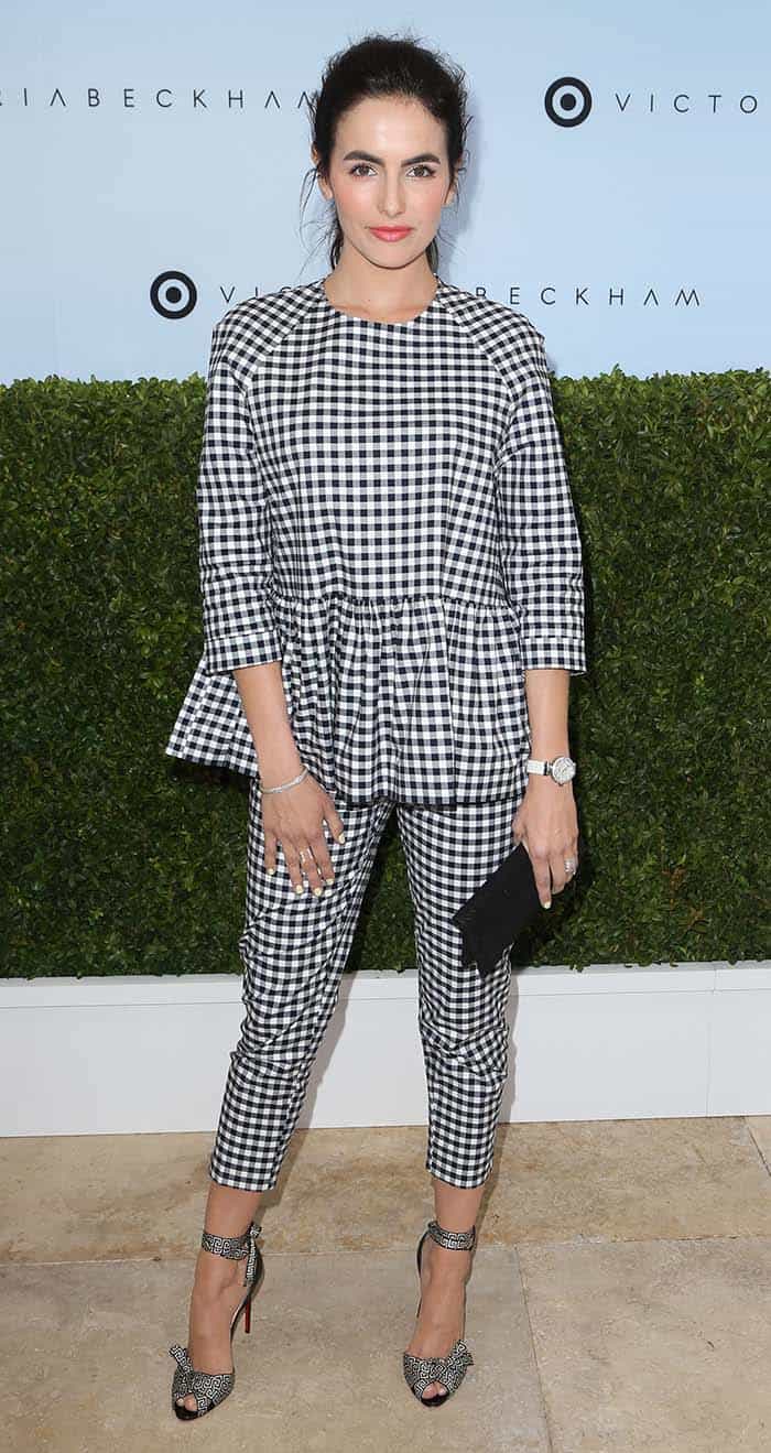 Camilla Belle wears gingham peplum top and trousers for the Victoria Beckham x Target event